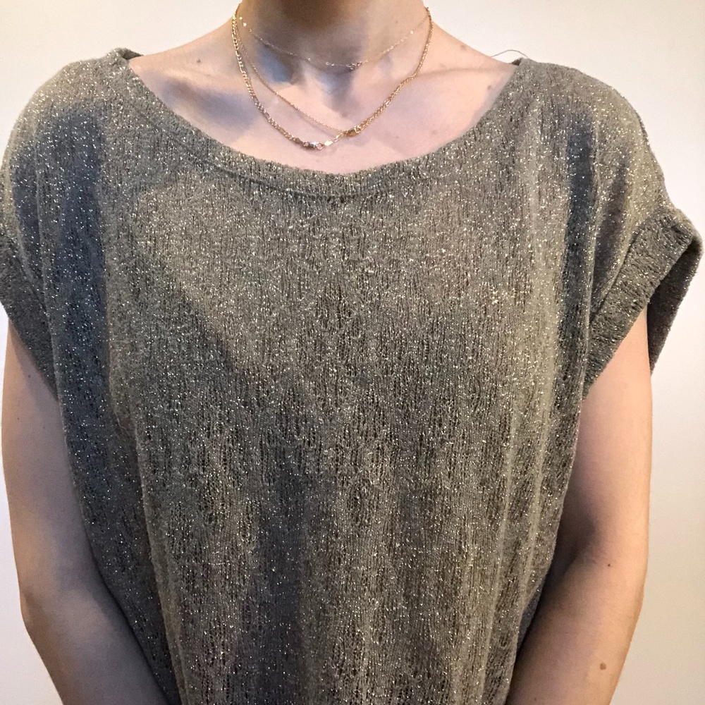 Gold and sparkly top.